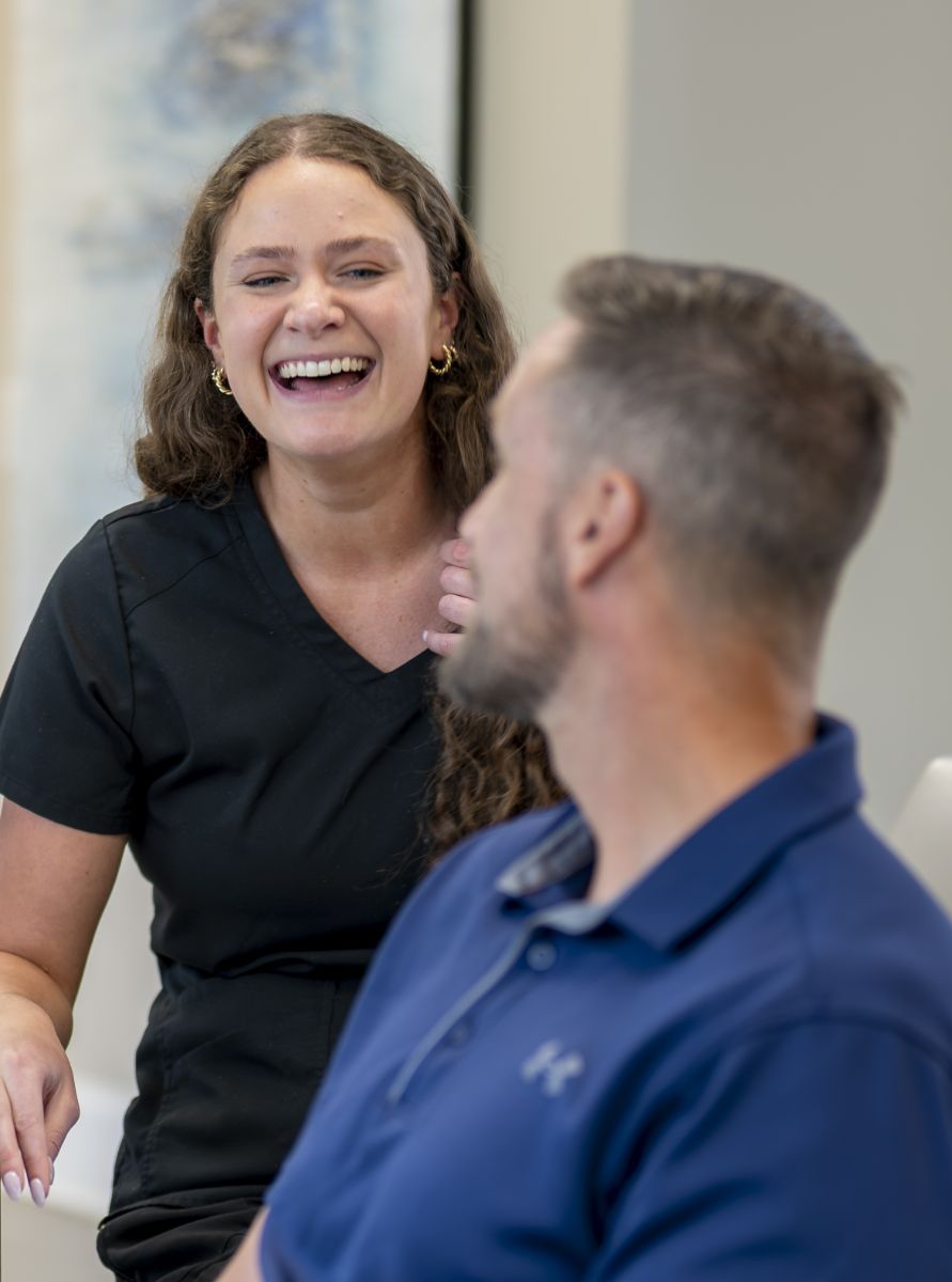 Selden Orthodontics team member with patient